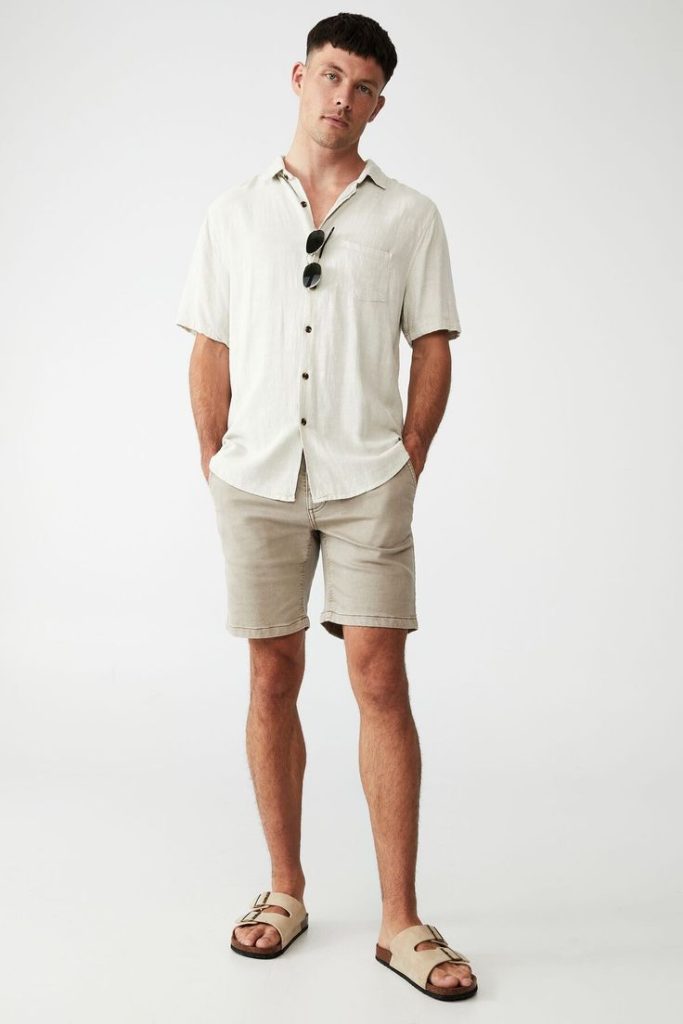 White Button-Down Shirt with Khaki Shorts