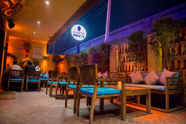 marine drivve club courtyard outdoor seating rajouri garden